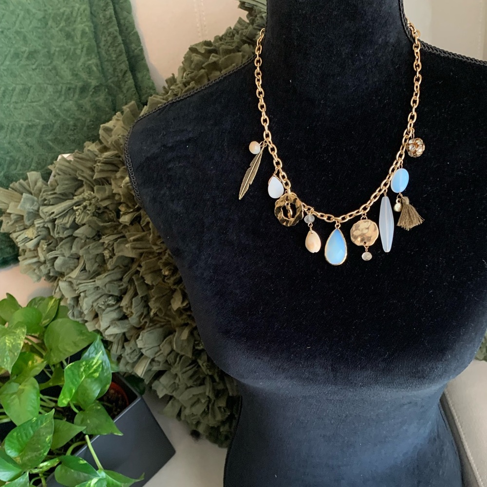 Beautiful gold tone charm necklace